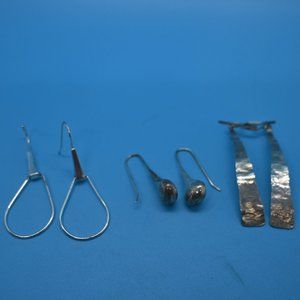 Three pairs of SS pierced earrings.